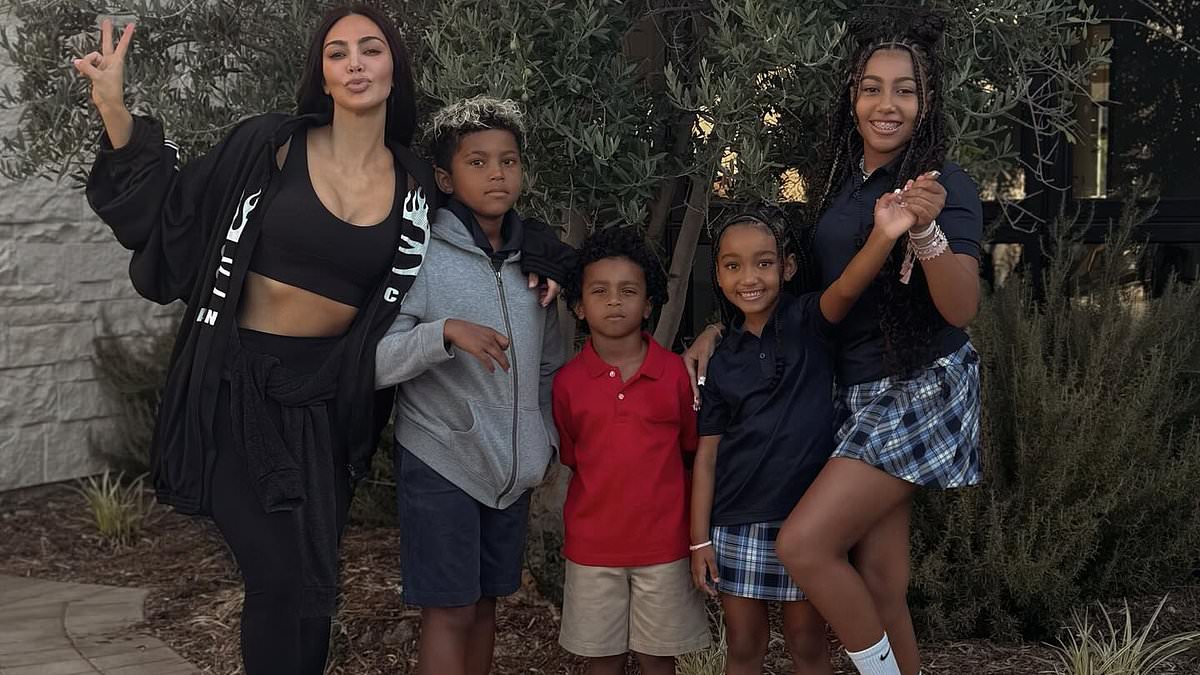 Kim Kardashian is praised by fans for sharing adorable down-to-earth snaps with all four of her kids as they head back to school